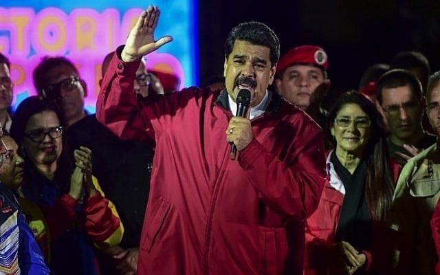 Venezuelan president Nicolas Maduro celebrates the results of the 'Constituent Assembly' elections in Caracas, on July 31, 2017. (AFP Photo/Ronaldo Schemidt) Venezuelan president Nicolas Maduro celebrates the results of the 'Constituent Assembly' elections in Caracas, on July 31, 2017. (AFP Photo/Ronaldo Schemidt)