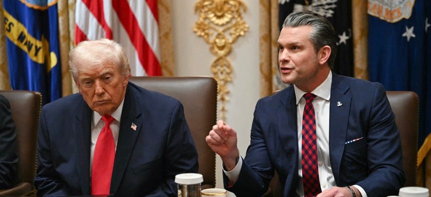 Defense Secretary Pete Hegseth speaks alongside President Donald Trump at the White House in Washington, D.C., on December 2, 2025.