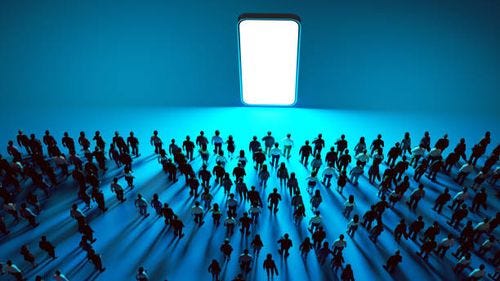 Connected Masses: The Unstoppable Attraction to Screens large crowd of people walking towards a gigantic, vertically positioned smartphone with a glowing white screen, set against a blue background. The people appear to be drawn to the phone as if it is a source of attraction or importance. This visual likely represents the powerful influence and magnetic pull of technology and social media in contemporary society. social influence stock pictures, royalty-free photos & images