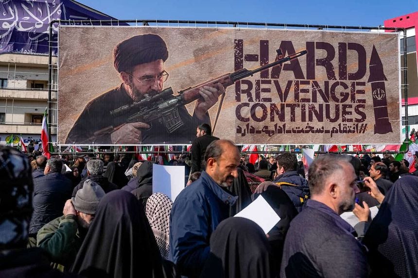 A banner depicting Iranian Supreme Leader Mojtaba Khamenei is displayed at Revolution Square in Tehran, March 11, 2026. Photo by Khoshiran/Middle East Images/AFP via Getty Images.